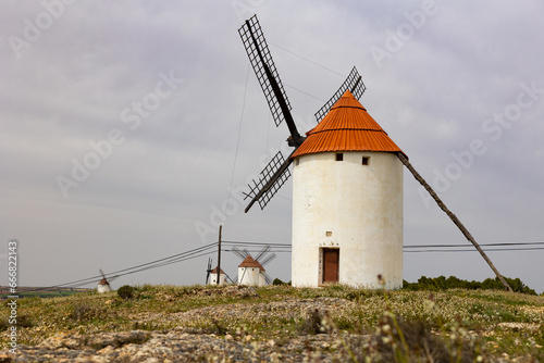 Row of reconstructed windmills of Mota del Cuervo, province of Cuenca, Spain.