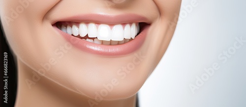 Attractive grin of a youthful lady with strong white teeth