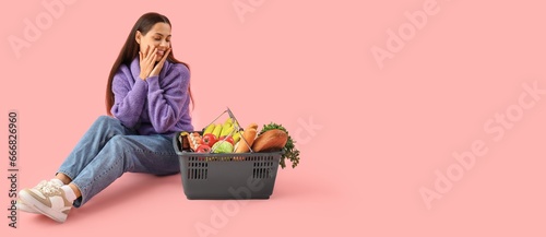 Young woman sitting near sh...