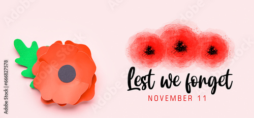 Paper poppy flower on light background. Remembrance Day in Canada