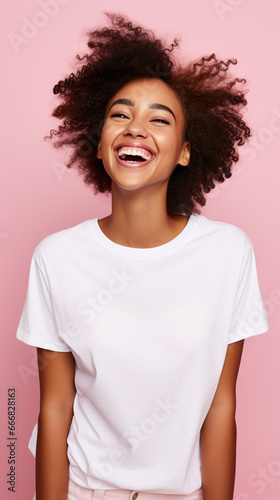 young girl in a T-shirt laughs merrily