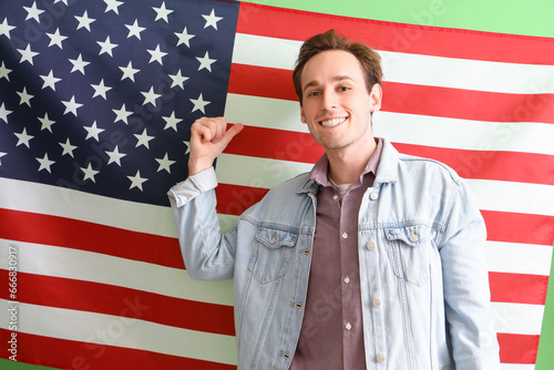Happy young man against USA...