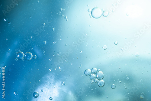 Air bubbles in the water background.Abstract oxygen bubbles in the sea.Water bubbles isolate on blue background.