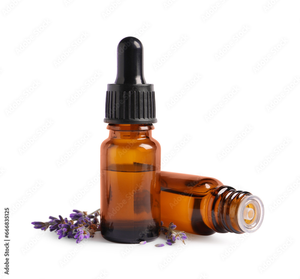 Essential oil and lavender flowers on white background Essential oil and lavender flowers on white background