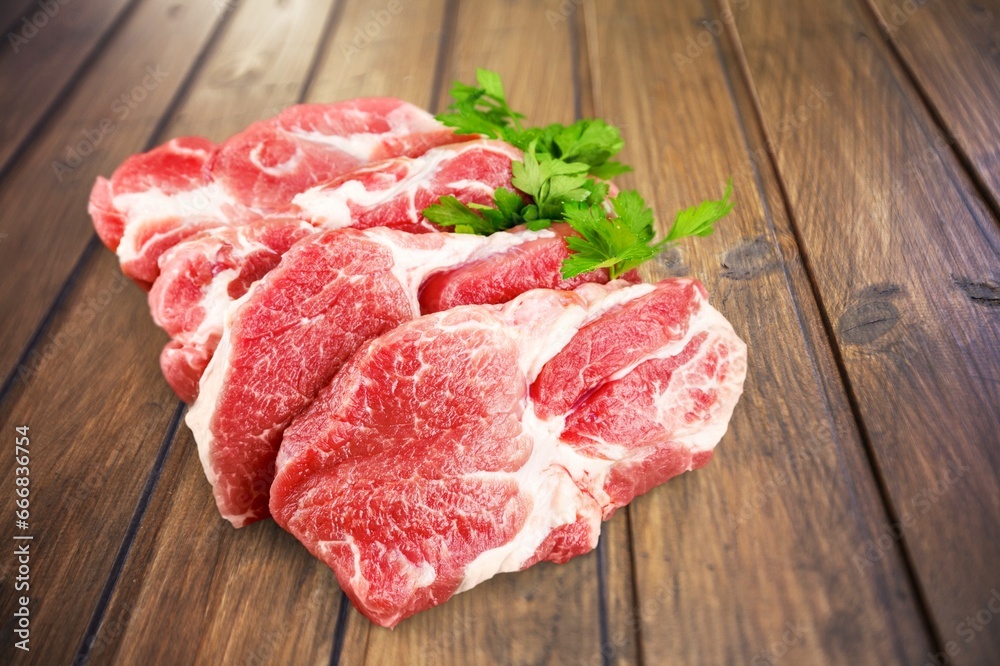 Raw fresh beef steak with herbs Raw fresh beef steak with herbs