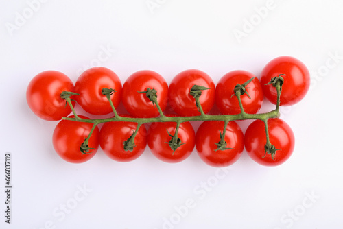 Vine of red ripe tomatoes on white background, top view