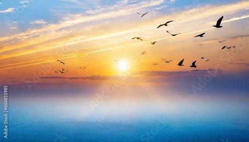 abstract beautiful peaceful summer morning sky background sunrise new day and flying flock of birds