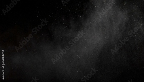 abstract real dust floating over black background