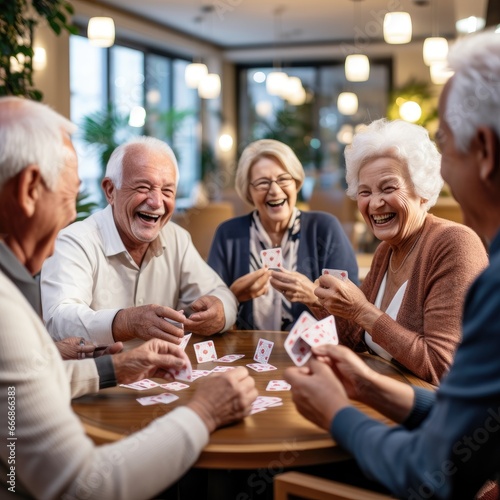 Group of seniors playing cards and sharing laughter in a retirement nursing home