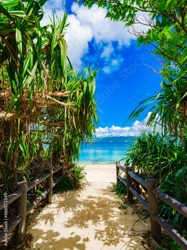 Beautiful view of tropical blue sea or ocean by the white beach and floating a cloud in summer, Okinawa in Japan, Nobody, Landscape or travel, High resolution over 50MP for wallpaper	 photo