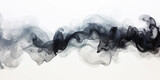 Black ink suspended in water with white background.