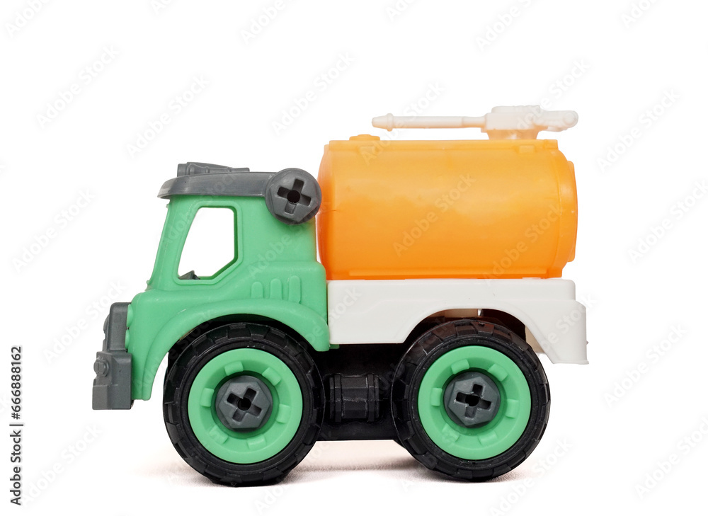 Naklejka premium side view of DIY plastic towing truck toy isolated on white background