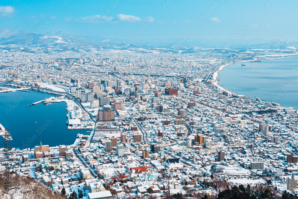 Beautiful landscape and cityscape from Hakodate Mountain with Snow in winter season. landmark and popular for attractions in Hokkaido, Japan.Travel and Vacation concept