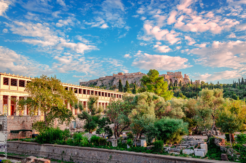 The Stoa of Attalos and the Ancient Agora, with the Acropolis Hill in the background. In Athens, Greece.