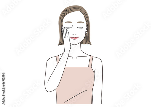 頬に手をあてて目を閉じ微笑む女性