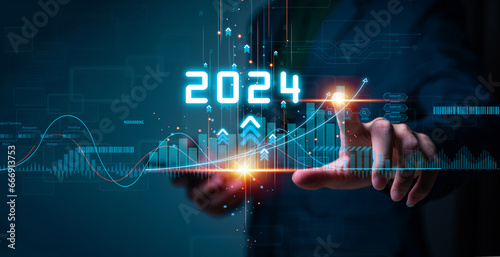 Businessman touching increase arrow graph corporate future growth year 2023 to 2024. New Goals with Plans and Visions for Next Year 2024, Opportunity, challenge and business strategy.
