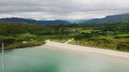 Aerial Shot of West Coast of Scotland Coastline Lifting to Loch Morar in The Scottish Highlands. United Kingdom. photo