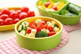 fresh vegetable salad served in a kid胢s bowl