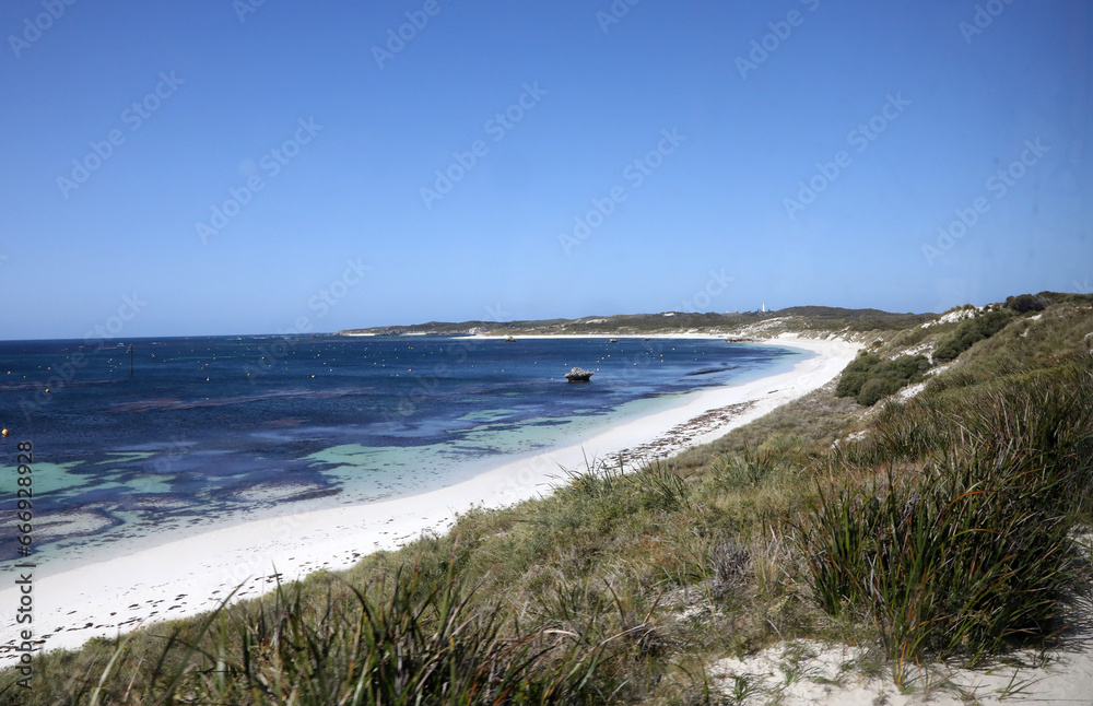 Beautiful coastal image of Rottnest Island off the West Australian coast. Showing clear water, waves, limestone rocks and vegetation Beautiful coastal image of Rottnest Island off the West Australian coast. Showing clear water, waves, limestone rocks and vegetation
