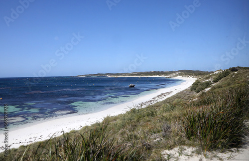 Beautiful coastal image of Rottnest Island off the West Australian coast.  Showing clear water  waves  limestone rocks and vegetation