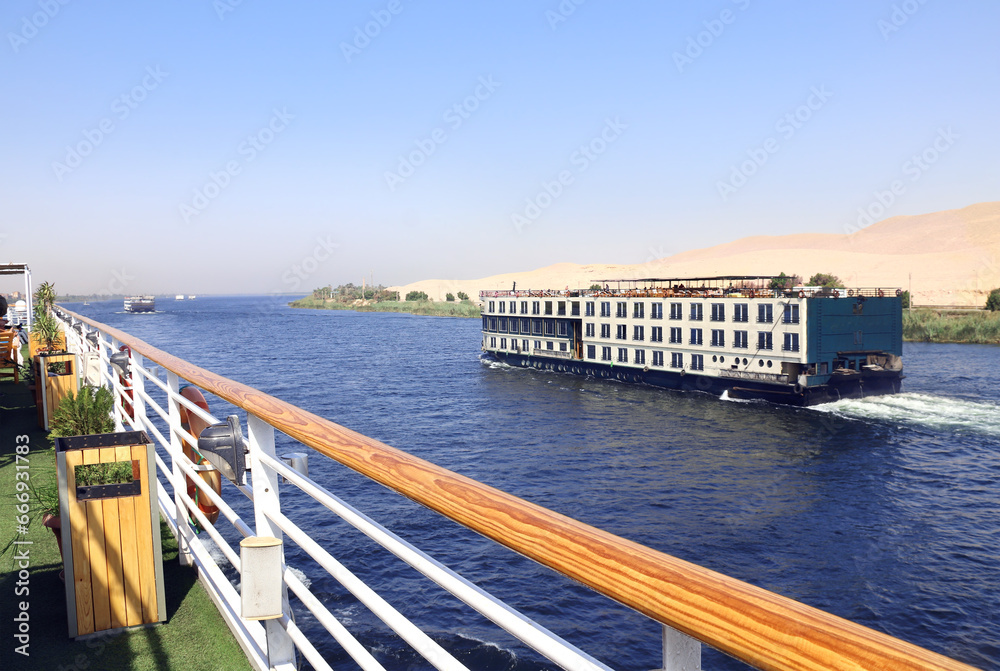 Fototapeta premium Cruise ship on the Nile river, Egypt, Africa. Luxury Nile Cruise. Summer vacation, relaxing on cruise ships