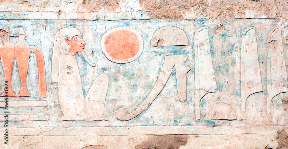 Ancient Colorful Mural Wall Painting inside Hatshepsut Temple in Valley of the Kings, Luxor, Egypt. Ancient Egyptian hieroglyphs, wall of the Hatshepsut temple in Western Thebes