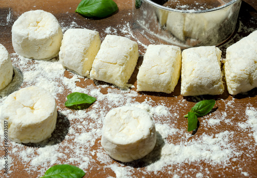 Homemade cheesecakes are ready for baking. photo