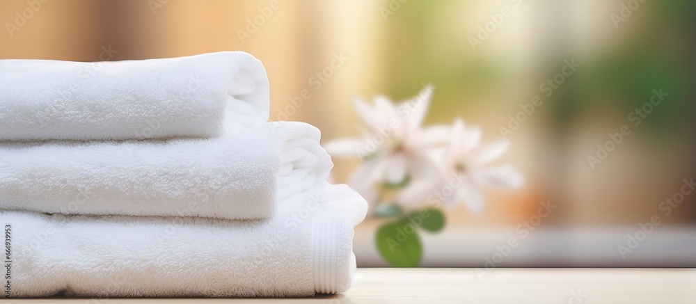 Blurred background with white towels and space for text Blurred background with white towels and space for text