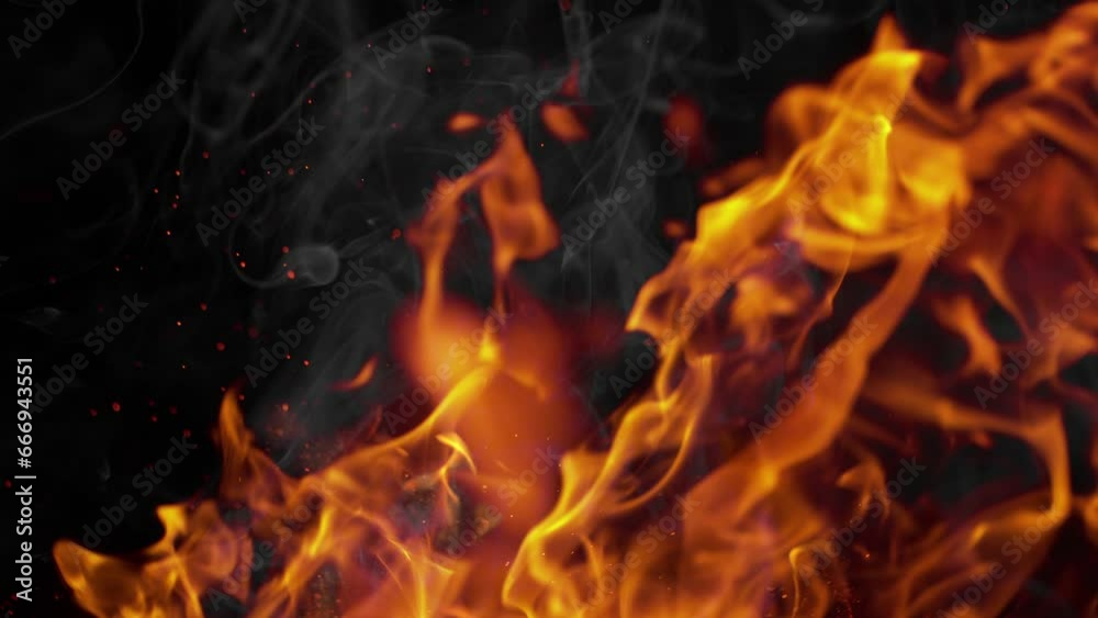 Super Slow Motion Shot of Flames, Smoke and Sparks Isolated on Black Background at 1000fps. Super Slow Motion Shot of Flames, Smoke and Sparks Isolated on Black Background at 1000fps.