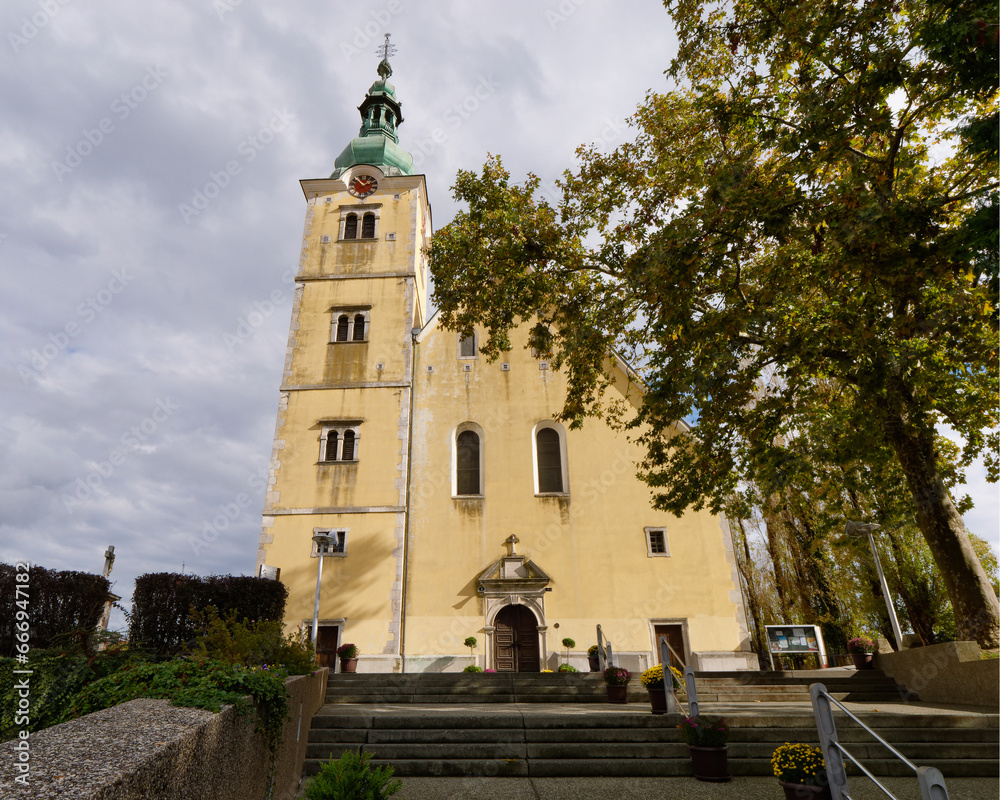 Low-angle view of a beautiful Parish Church of Saint Anastasia with a cloudy sky in the background in the town of Samobor, Croatia