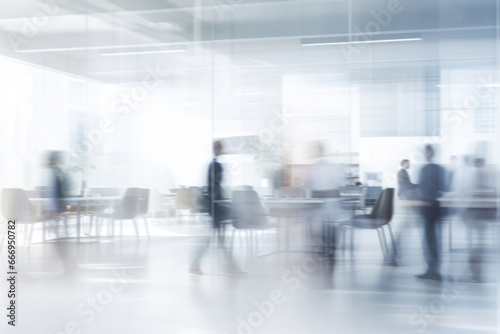 blurred business people working and talking in an office