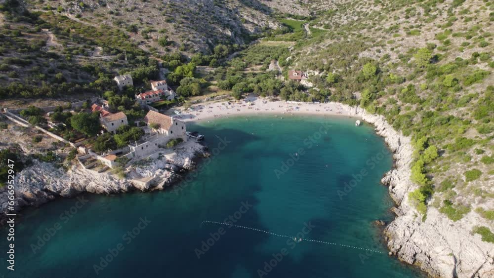 Secluded paradisiac beach bay of Dubovica Hvar Island, aerial drone shot Secluded paradisiac beach bay of Dubovica Hvar Island, aerial drone shot