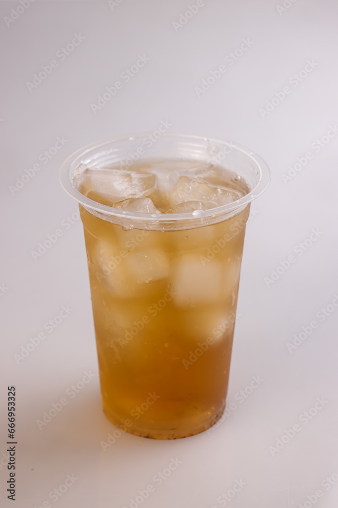 Es Teh or A Glass of Ice Tea Isolated on White. Es Teh or A Glass of Ice Tea Isolated on White.