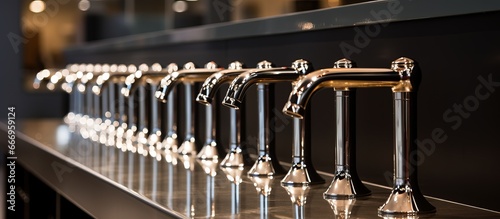 A variety of metal taps on display at a store