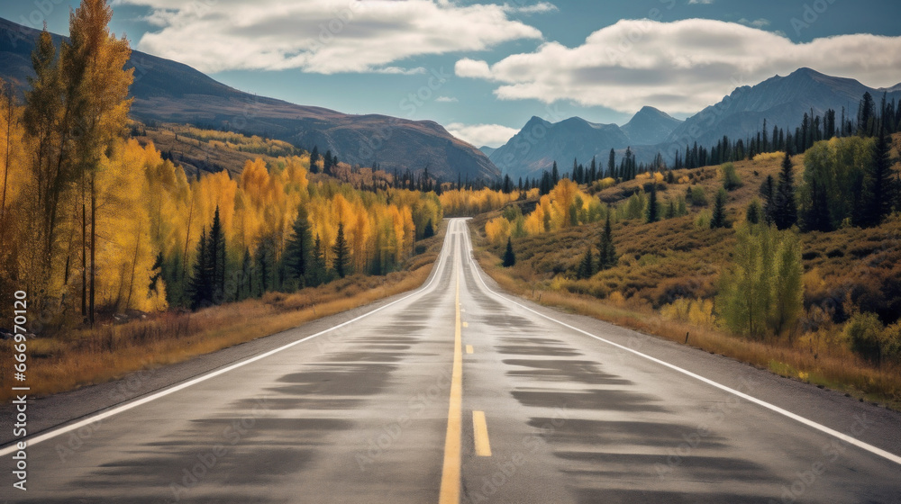 Fototapeta premium Road leading to autumn mountain scenery.
