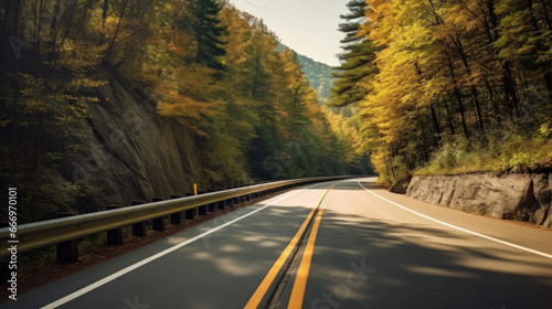 Road leading to autumn mountain scenery.