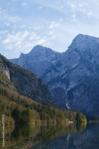 Mountain Lake and Trees on a Sunny Autumn Day with Blue Sky