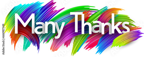 Many thanks paper word sign with colorful spectrum paint brush strokes over white.