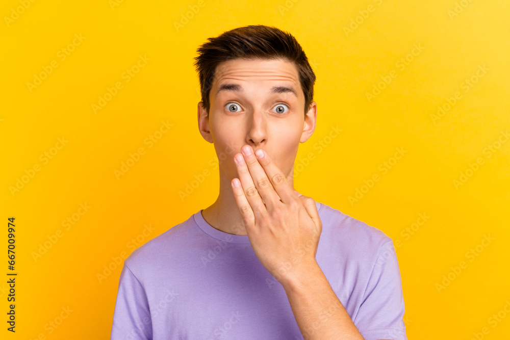 Young handsome man standing over isolated vivid background shocked covering mouth with hands for mistake. Secret concept Young handsome man standing over isolated vivid background shocked covering mouth with hands for mistake. Secret concept
