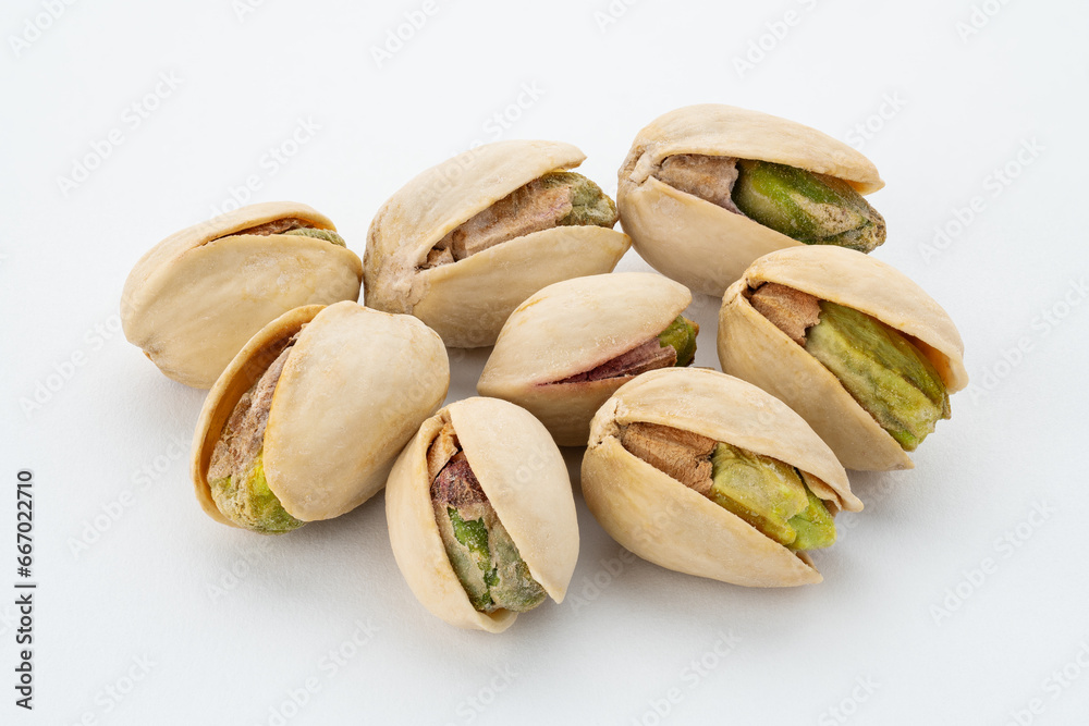 Salted Pistachios for Beer, Macro, Spin. Isolated Background of a Beer Snack of Salted Pistachio Nuts. Healthy Delicious Pistachios. Salted roasted pistachio macro Salted Pistachios for Beer, Macro, Spin. Isolated Background of a Beer Snack of Salted Pistachio Nuts. Healthy Delicious Pistachios. Salted roasted pistachio macro