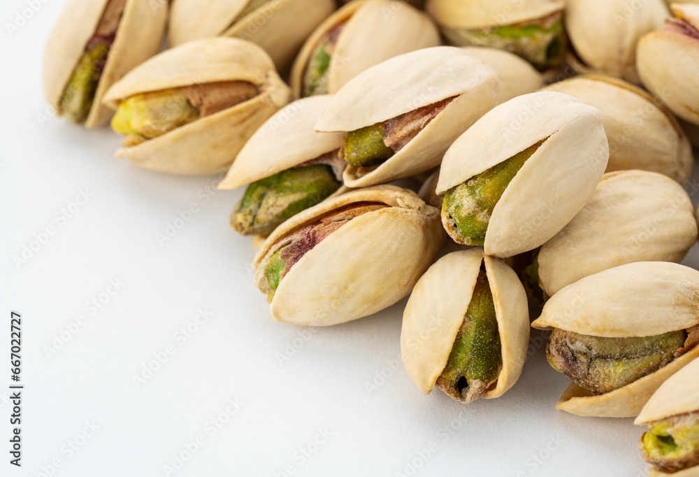Salted Pistachios for Beer, Macro, Spin. Isolated Background of a Beer Snack of Salted Pistachio Nuts. Healthy Delicious Pistachios. Salted roasted pistachio macro Salted Pistachios for Beer, Macro, Spin. Isolated Background of a Beer Snack of Salted Pistachio Nuts. Healthy Delicious Pistachios. Salted roasted pistachio macro