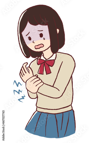 腕を痛がる女子学生