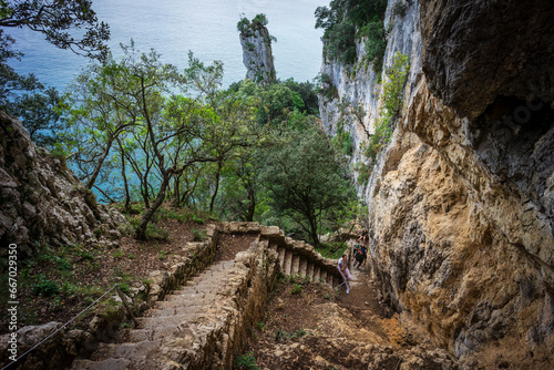 ascent of the stairs of Del Caballo lighthouse, Buciero mountain, Santoña, Cantabria, Spain photo