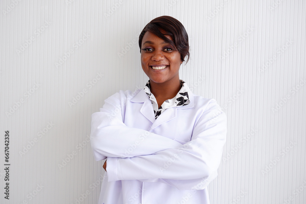 Young female doctor standing and smiling medical concept. Young female doctor standing and smiling medical concept.