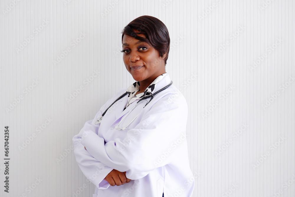 Young female doctor standing and smiling medical concept. Young female doctor standing and smiling medical concept.