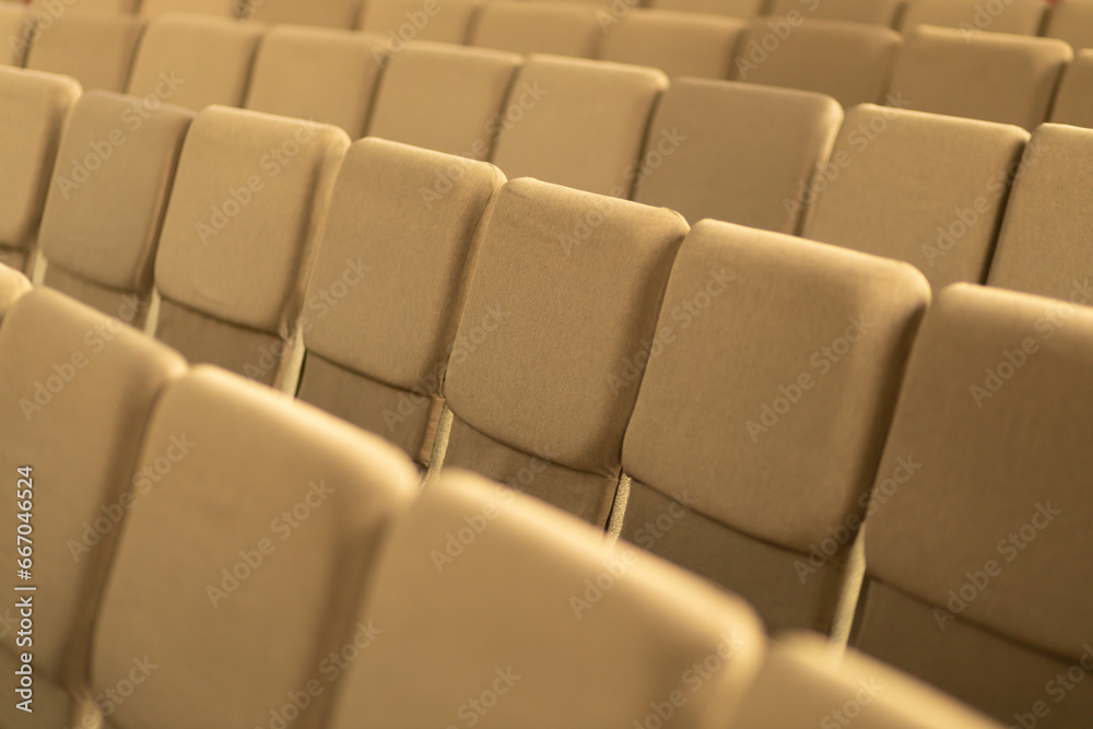 Fototapeta premium Empty chairs in the hall. The conference hall is empty. Social distance.