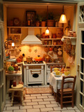 Kitchen interior in a doll house. Beautiful dollhouse