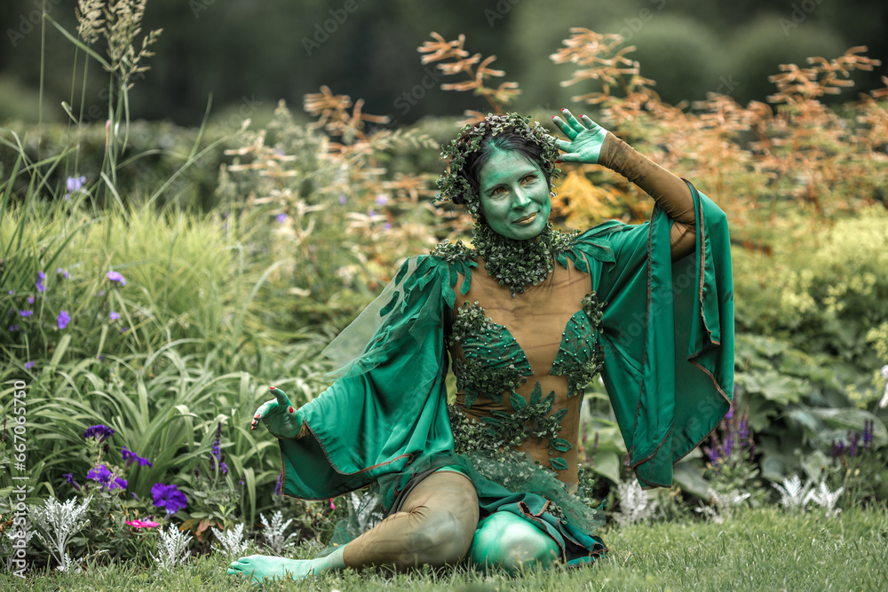 Ταπετσαρία A mystical green dryad in the forest in the background