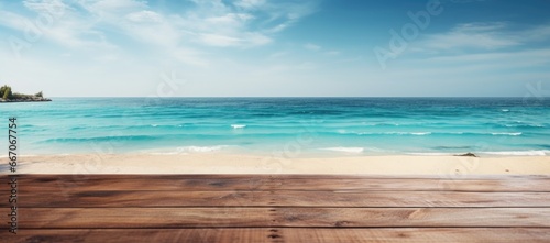 An unadorned wooden surface next to the beach view