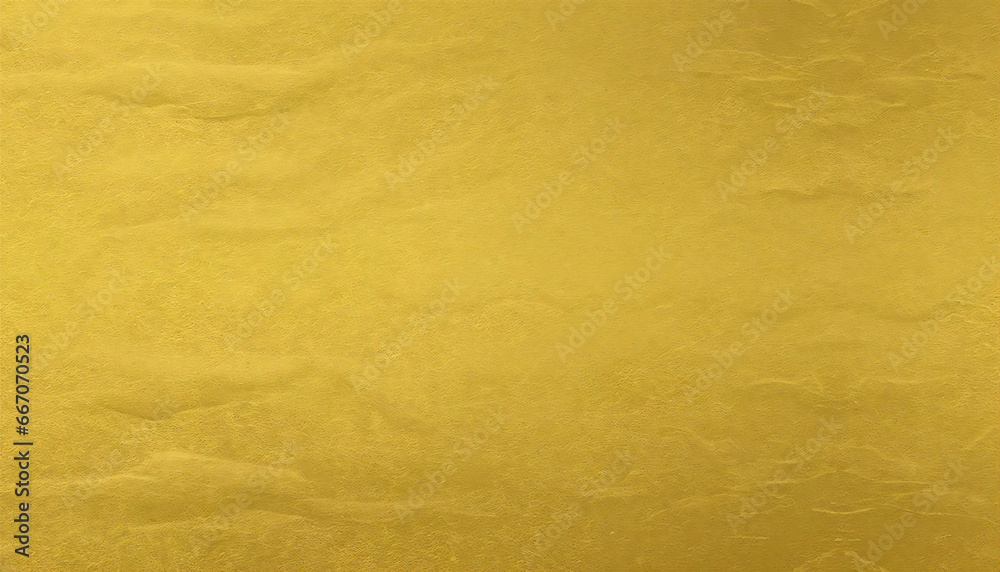 A luxurious golden background material. Textured gold gradient background material. A luxurious golden background material. Textured gold gradient background material.